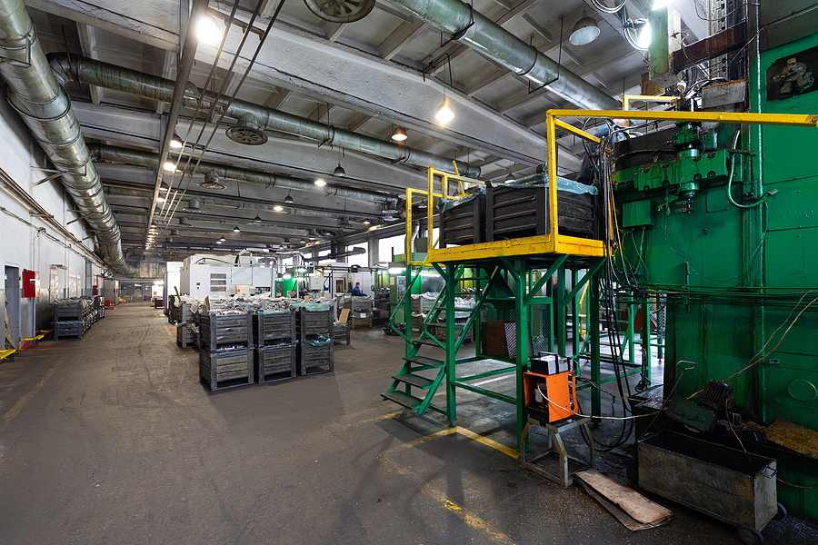 The Interior Of A Big Industrial Building Of Factory With Steel